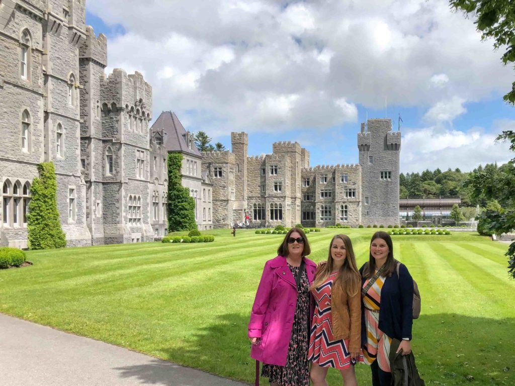 3 women standing outside Ashford Castle in Ireland