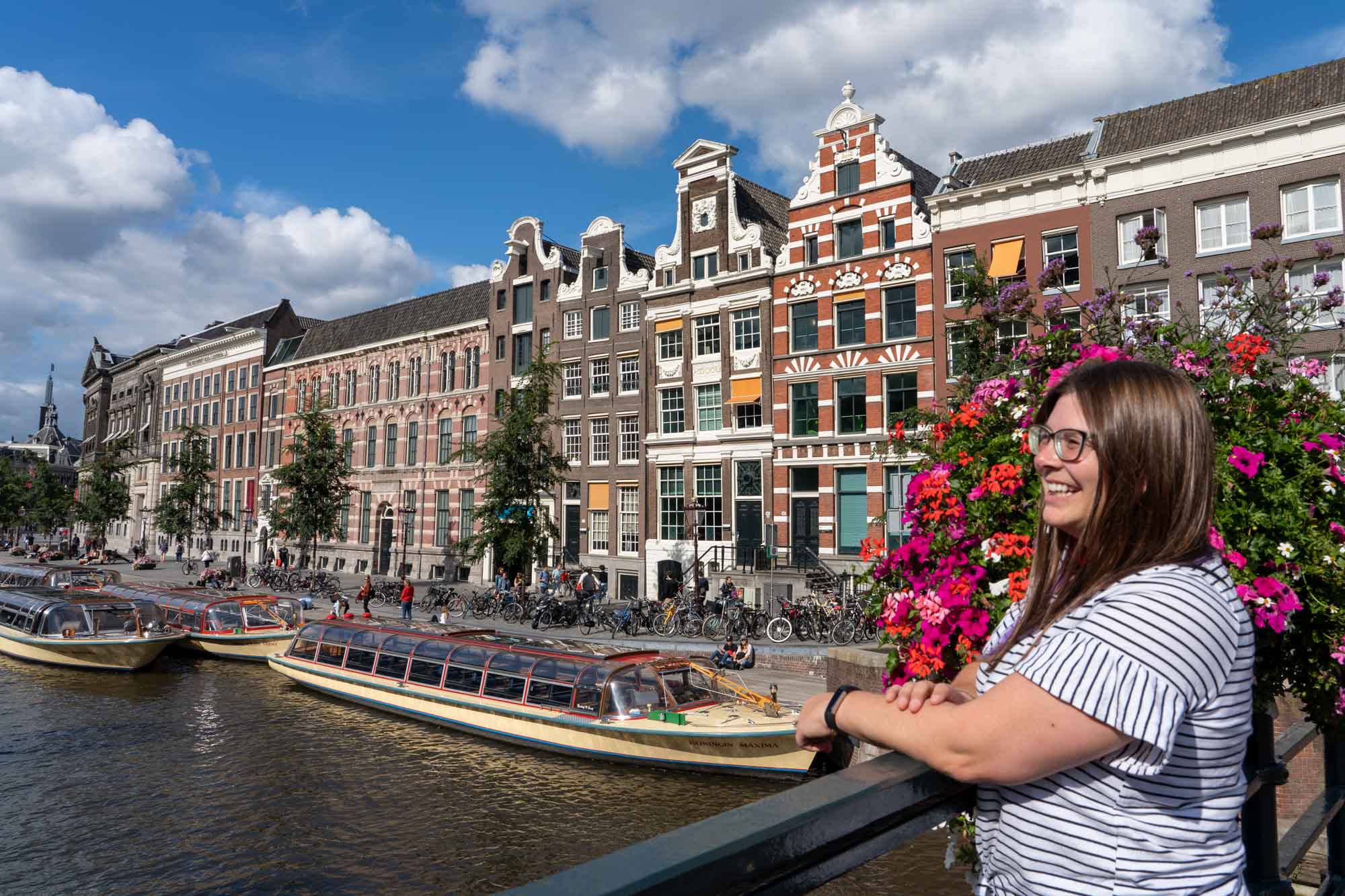 Feature image Amanda at a canal in Amsterdam