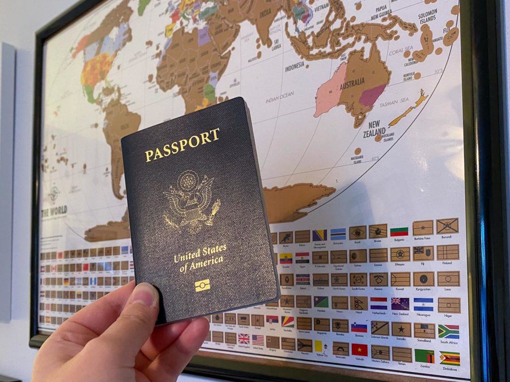 Passport in front of a map