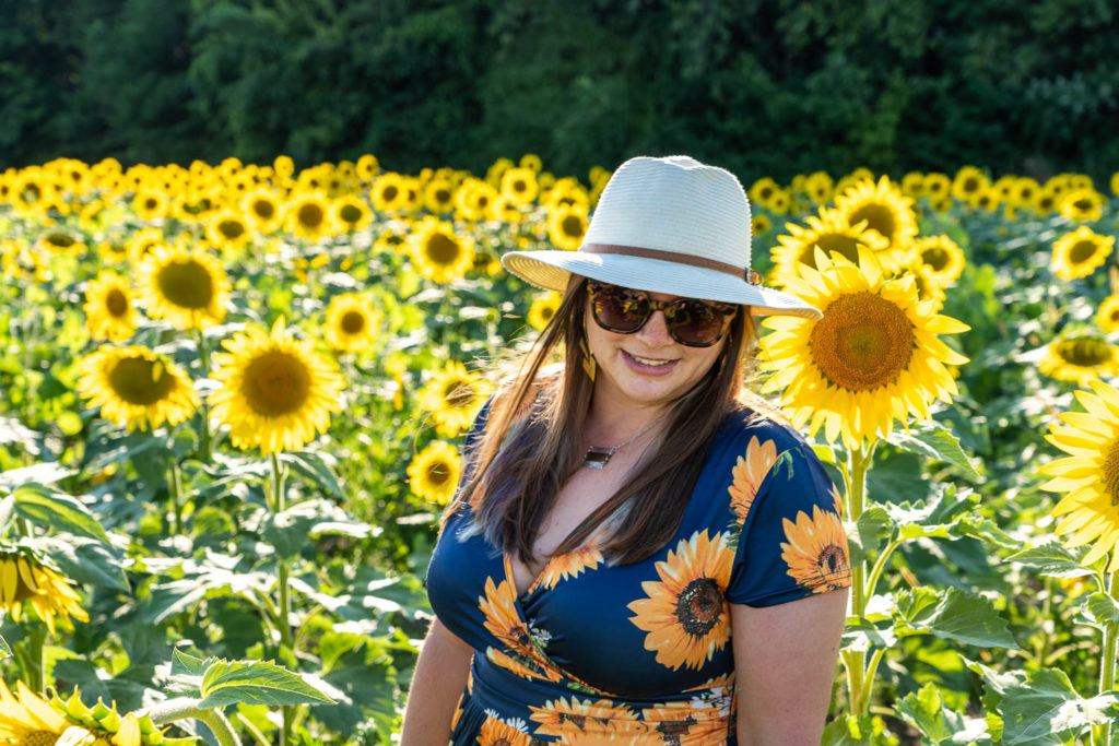 Amanda in a sunflower field