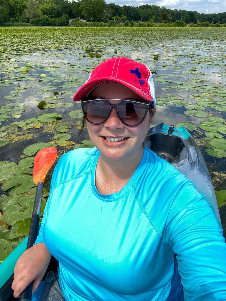 Amanda kayaking on Lake Wingra in Madison