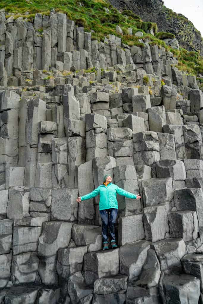 Amanda on basalt columns at Reynisfjara Beach