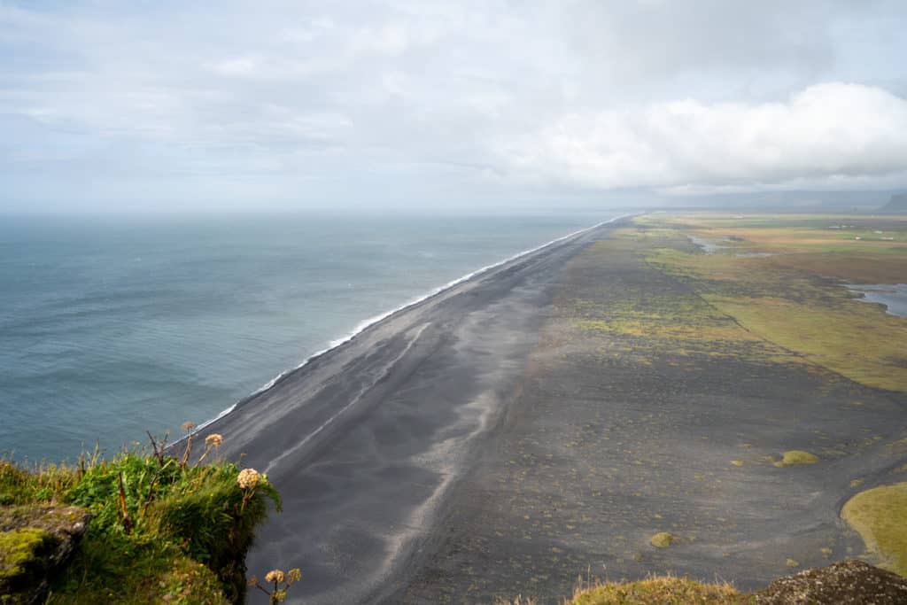 Dyrhólaey Viewpoint over a long black sand beach