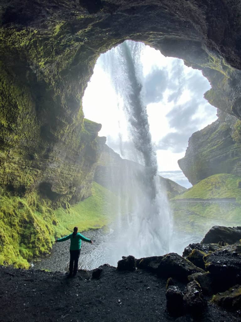 Amanda behind Kvernufoss waterfall