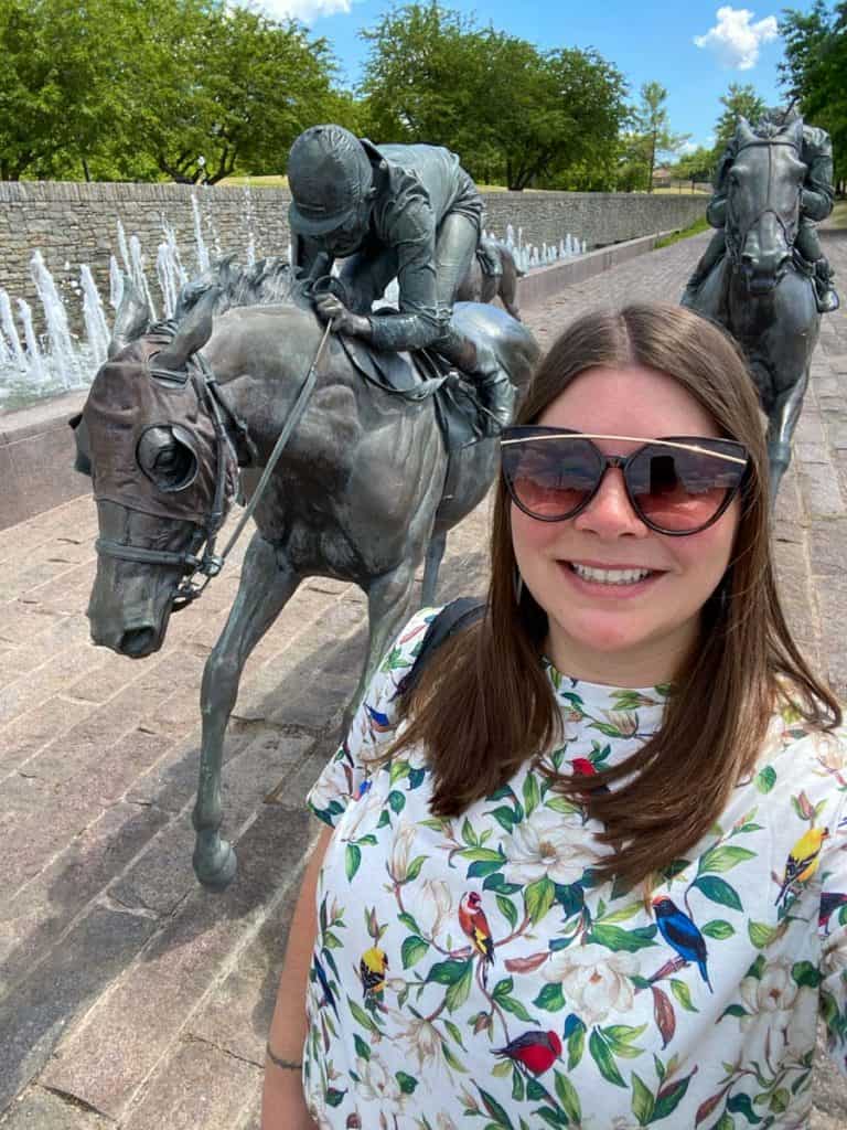 Amanda with race horse statues in Lexington