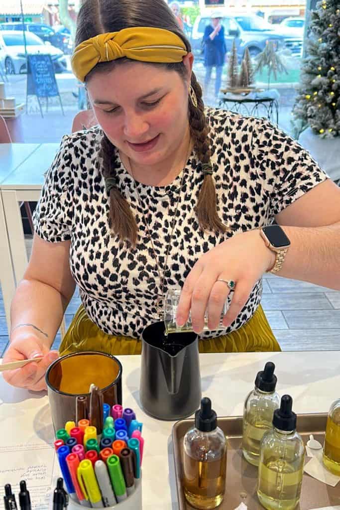 Amanda making a candle at Light + Bark