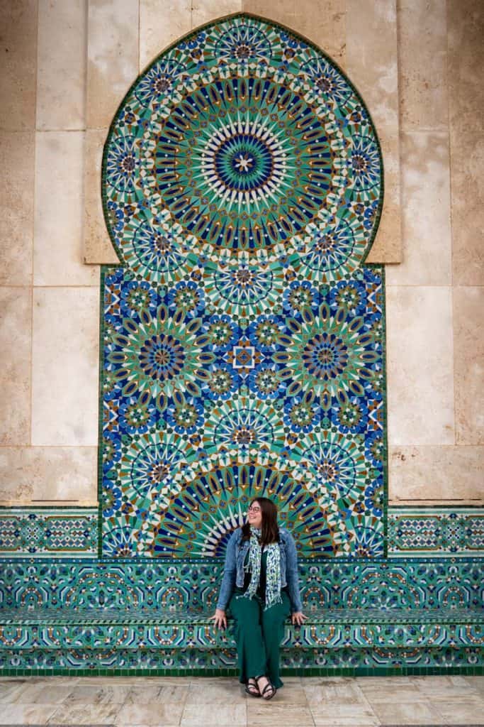 Amanda in front of mosaic tile at Hassan II Mosque