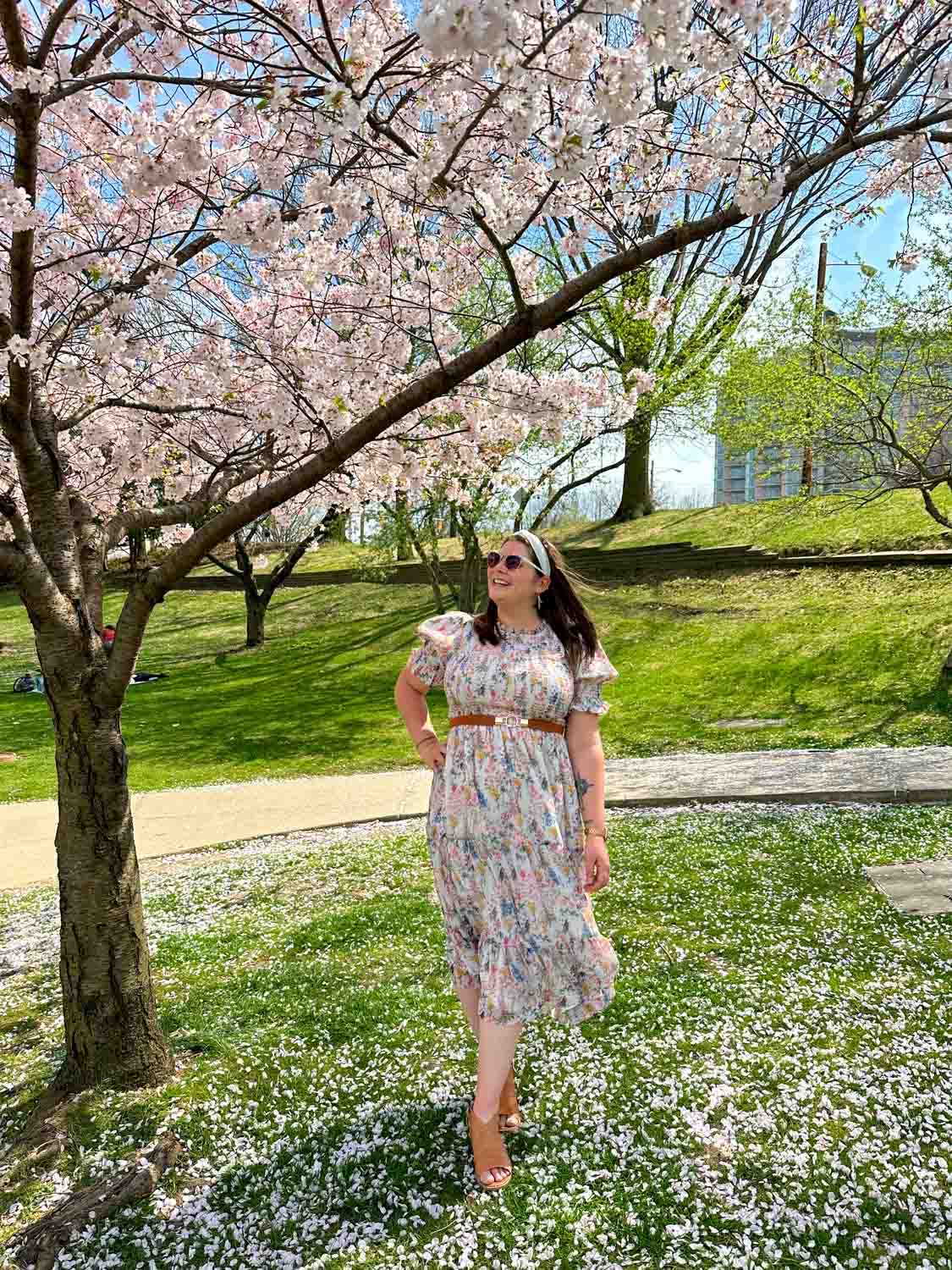 Amanda under a cherry blossom tree